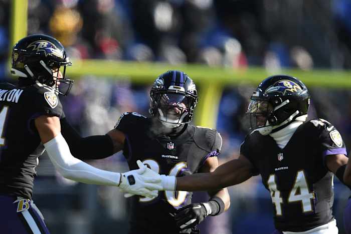 Dec 24, 2022; Baltimore, Maryland, USA; Baltimore Ravens cornerback Marlon Humphrey (44) celebrates with safety Kyle Hamilton (14) after a tackle during the first half against the Atlanta Falcons at M&T Bank Stadium. Mandatory Credit: Tommy Gilligan-USA TODAY Sports